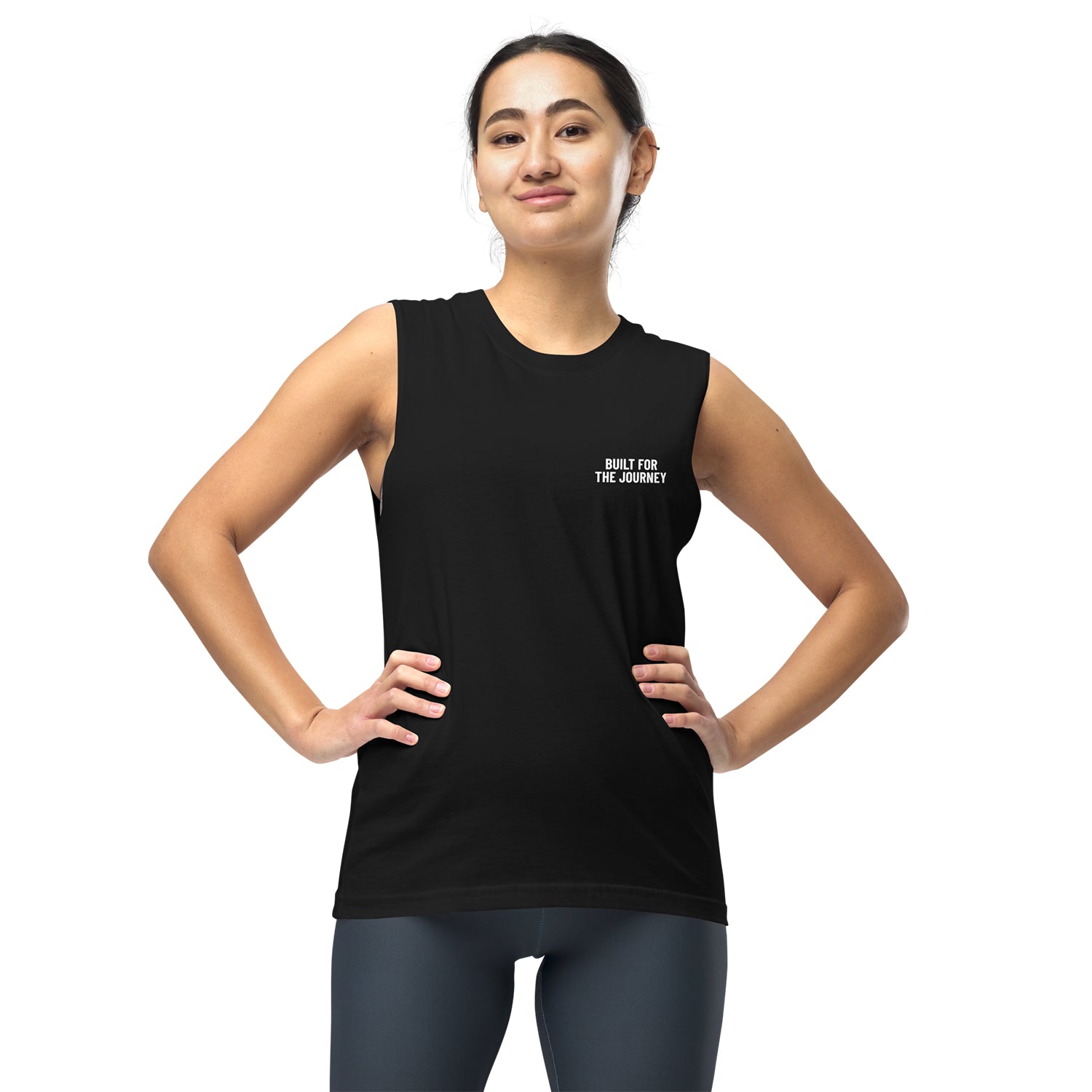 Woman wearing a black Built for the Journey Performance Tank